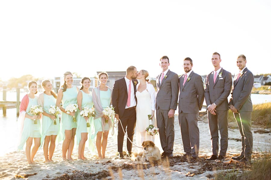 Jesse and Julia standing with their groomsmen and bridesmaids
