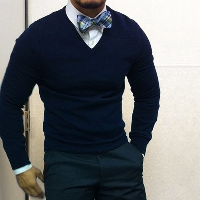 Man wearing bow tie with a black sweater