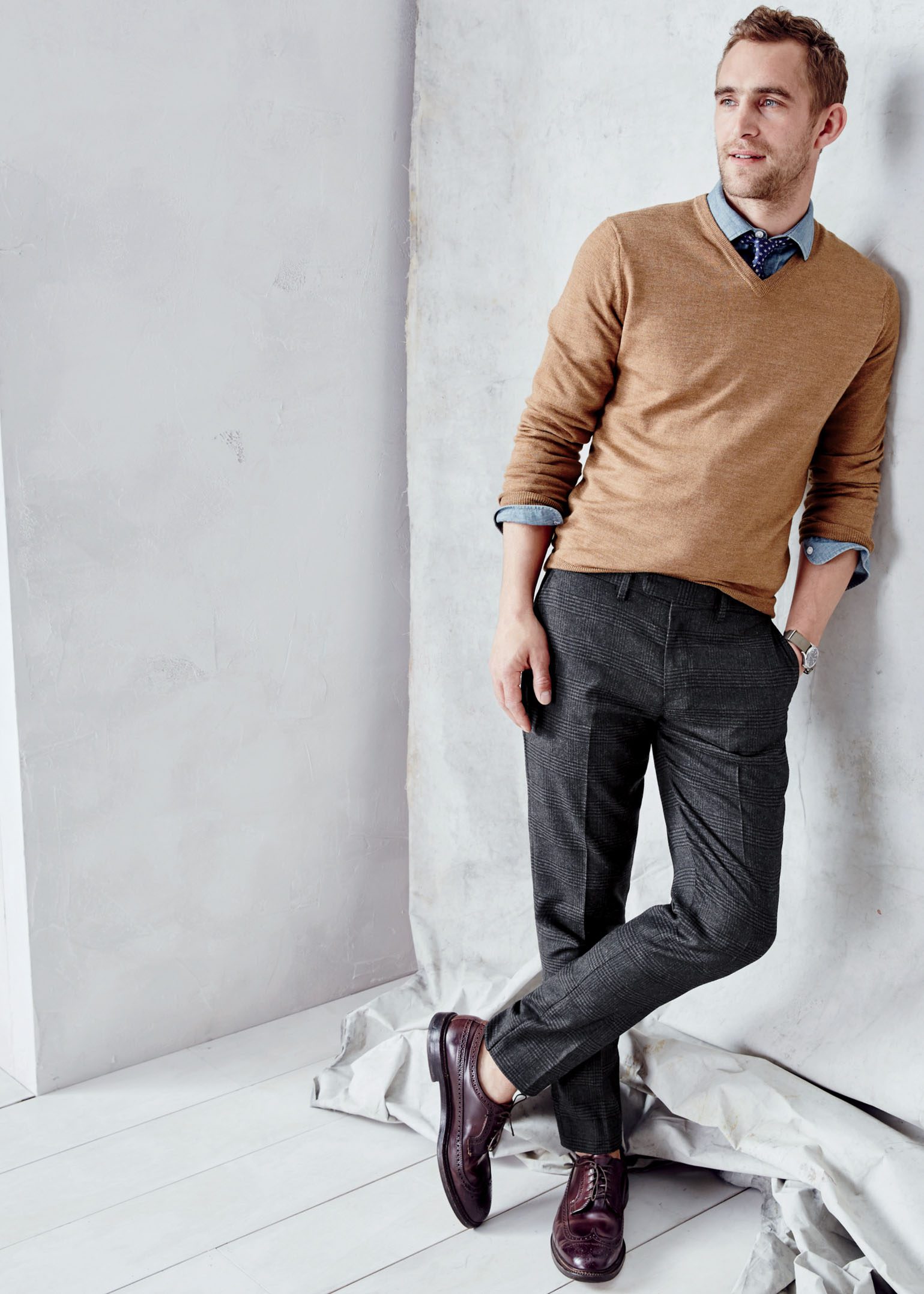 Man wearing a brown J. Crew v-neck sweater