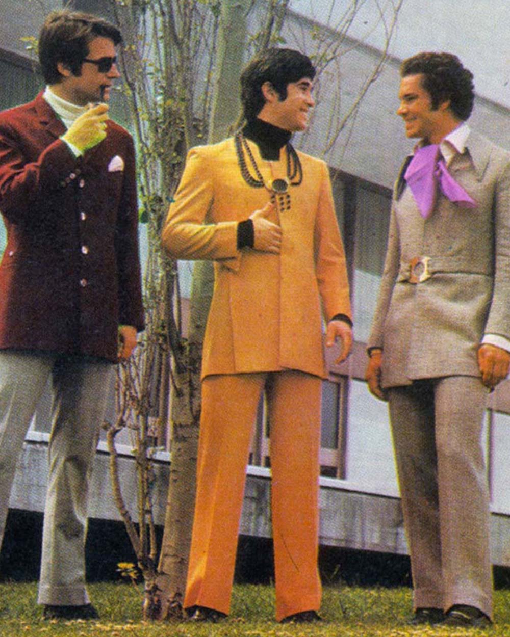 men in 1970s wearing colorful suits