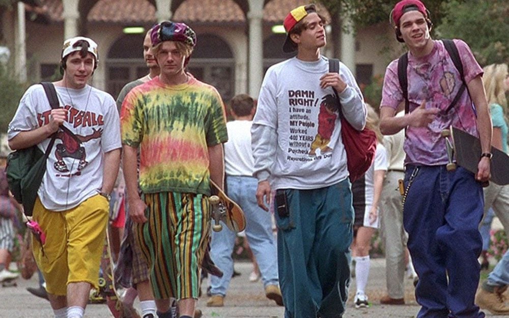 men in 1990s wearing colorful, casual clothing