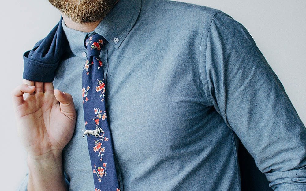 tie bar worn with casual outfit