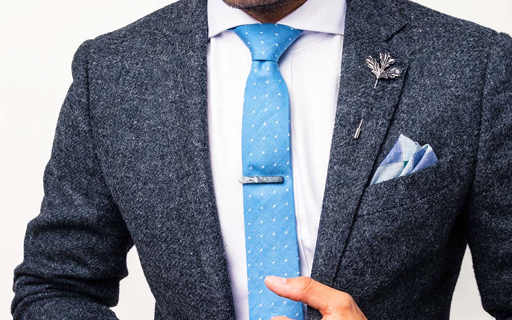 Man wearing suit and pocket square