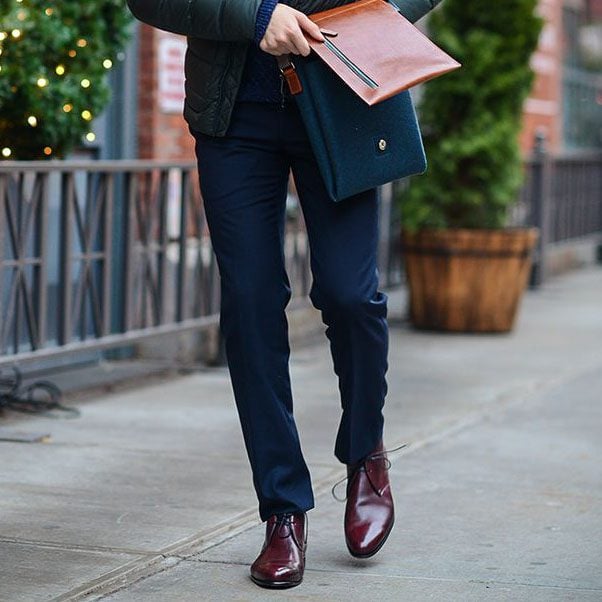 man wearing red dress shoes