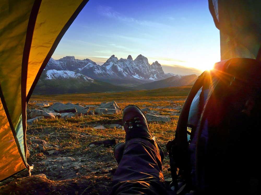 man-camping-in-mountains