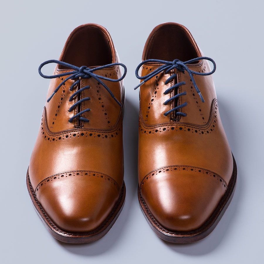 Brown dress shoes with diagonal lacing