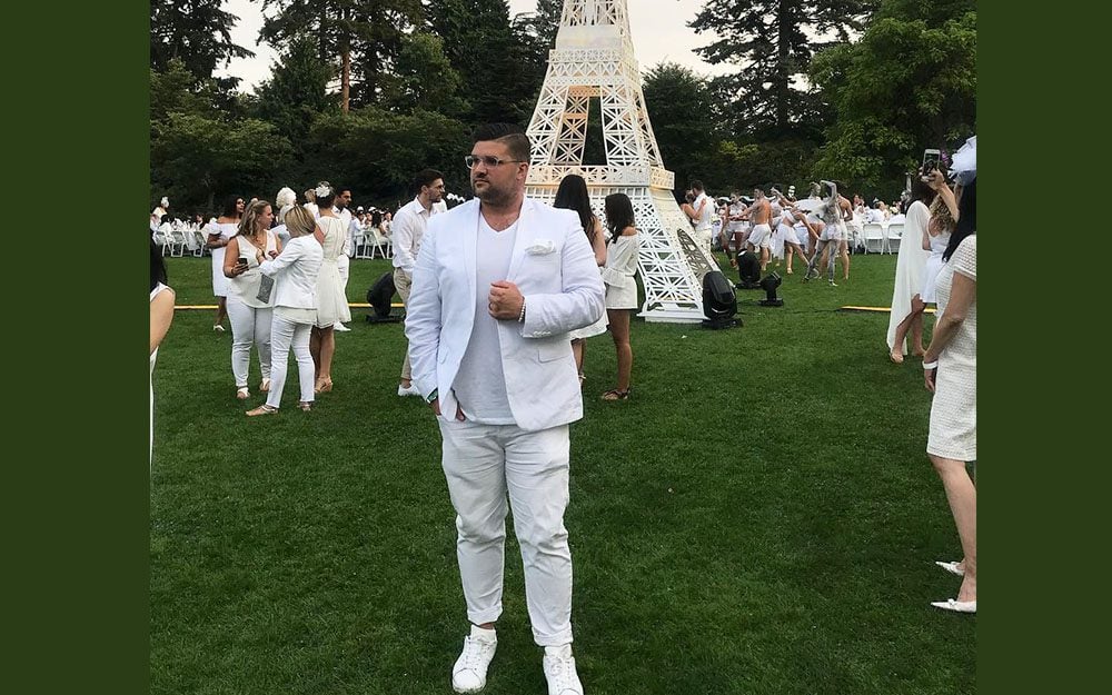 man wearing white suit