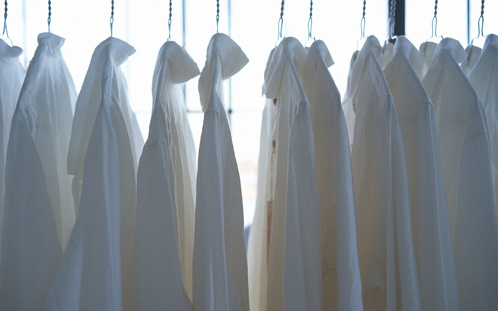 White shirts on rack