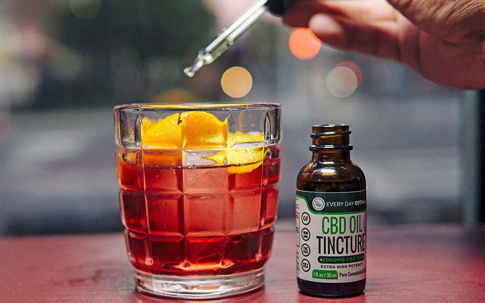 cbd being added to a cocktail